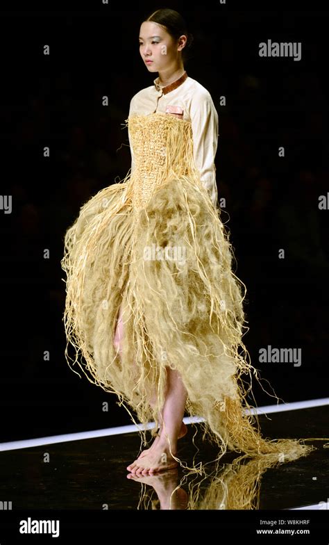 A model displays a new creation at Hempel Award - The 24th China International Young Fashion ...