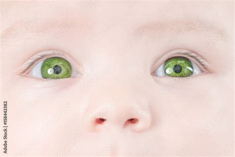 Cute Baby With Green Eyes