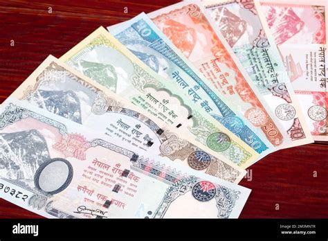 Nepalese money - rupee a business background Stock Photo - Alamy