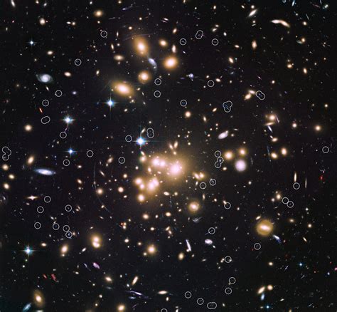 Abell 1689 Helps Astronomers Discover Dozens of Early Galaxies | Sci.News