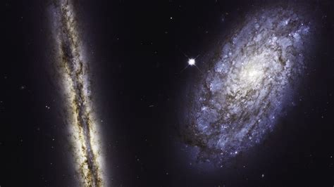 NASA's Hubble telescope captured two galaxies in one epic photo — Quartz