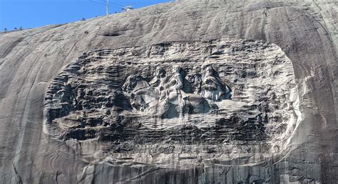 The Confederate Memorial Carving at Stone Mountain Park Represents the Past and Defines the ...