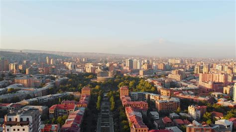 Panoramic wide Yerevan city center view from cascade complex on sunrise ...