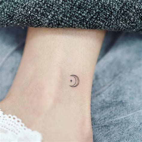 Tiny moon and star tattoo done on the ankle,