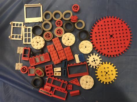 Thrift store haul, some 60s bricks plus a few modern and a few cellulose acetate bricks : r/lego