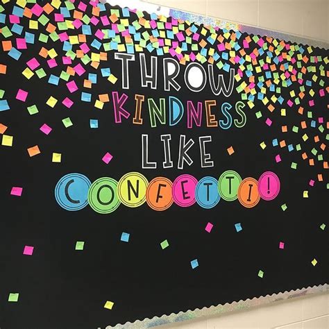 a bulletin board with the words throw kindness like confetti written in multicolored letters