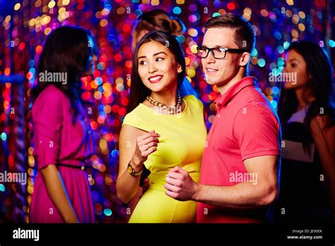 Young people dancing at disco party Stock Photo - Alamy