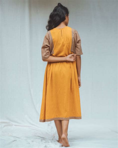 Marigold dress by The Sweven Studio | The Secret Label