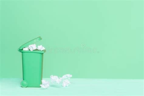 Green Recycle Bin on Green Background, Great for Recycling Concepts and ...