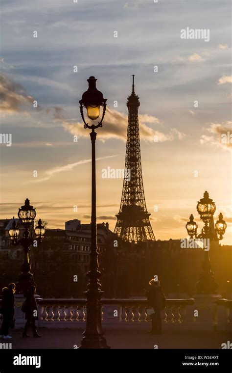 Eiffel Tower with dramatic sunset at Pont Alexandre III Stock Photo - Alamy