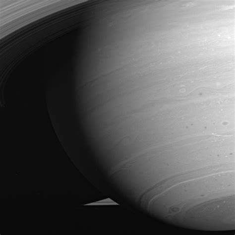 The Swirling Storms of Saturn - NASA Astronomy Picture of the Day Collection