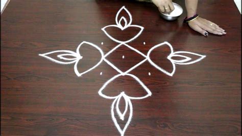 Easy rangoli designs for diwali with 7 to 1 dots- deepam kolam designs ...