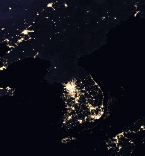 Satellite image of the Korean Peninsula at night, showing North Korea ...