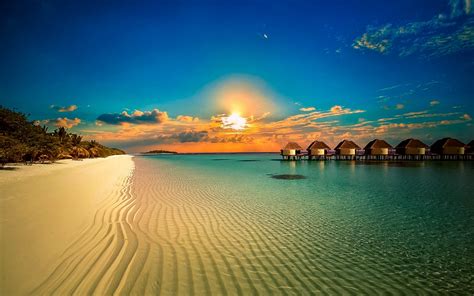 Download Sand Horizon Sunset Hut Bungalow Ocean Beach Tropical Man Made Resort HD Wallpaper