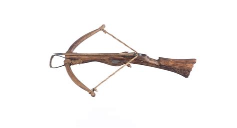 Premium Photo | Ancient crossbow isolated on white background