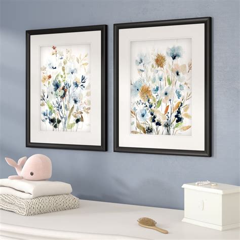 Or this set of framed flower prints that you can place on a blank wall that's currently begging ...