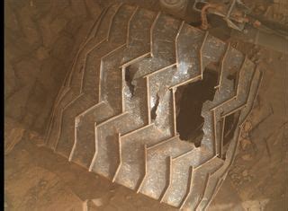 Rugged Mars has taken big bites out of Curiosity rover's wheels (photos) | Space