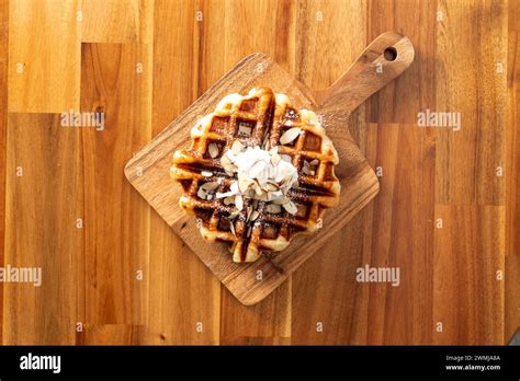 Jeju, tangerine tea, almond croffle, croissant, waffle, plain Stock Photo - Alamy