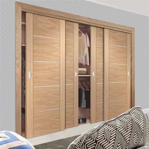 Four Sliding Maximal Wardrobe Doors & Frame Kit - Portici Oak Flush Door - Aluminium Inlay ...