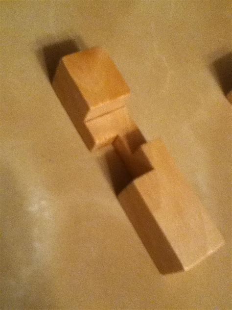 solvability - How to solve this 3D wooden puzzle which becomes an interlocking cross? - Puzzling ...