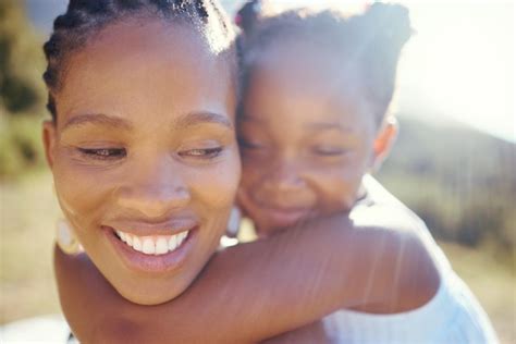 Premium Photo | Happy black mother and playful daughter having fun ...