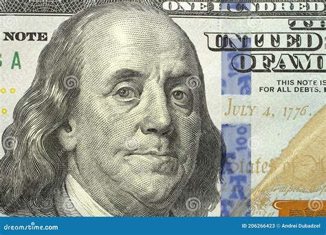 Macro Shot of a New 100 Dollar Bill, Portrait of US President Benjamin Franklin. 100 Dollar Bill ...