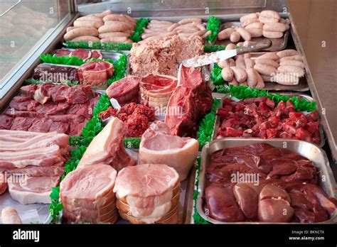 meat display in a butchers shop Stock Photo - Alamy