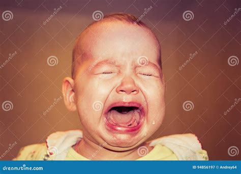 Portrait Of A Crying Baby. Tears On The Face Stock Image | CartoonDealer.com #94856197