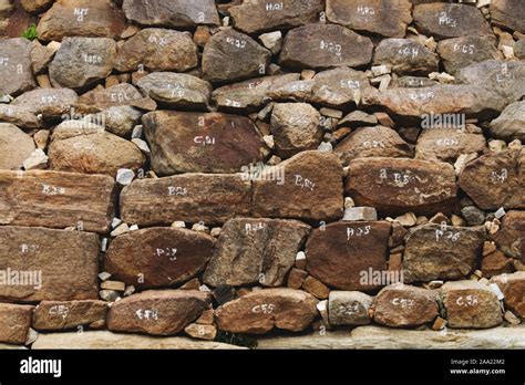 Texture, background and pattern of caste stone wall Stock Photo - Alamy