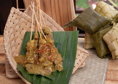 Premium Photo | Sate padang or satay padang is spicy beef satay from ...