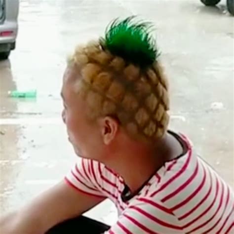 Fruit vendor gets hilarious pineapple haircut to look 'more professional'