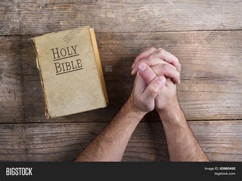 Bible Praying Hands Image & Photo (Free Trial) | Bigstock