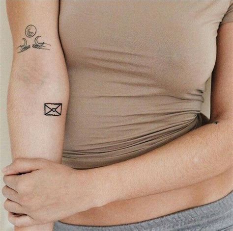 Small letter tattoo on the forearm - Tattoogrid.net