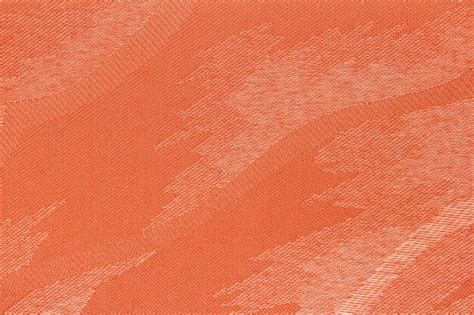 Premium Photo | Orange Fabric blind curtain texture