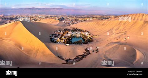 Aerial sunset view of the Huacachina Oasis in the Atacama desert of Peru Stock Photo - Alamy