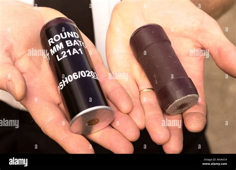 Baton rounds showing the unfired cartridge on the left and the baton round or rubber bullet on ...