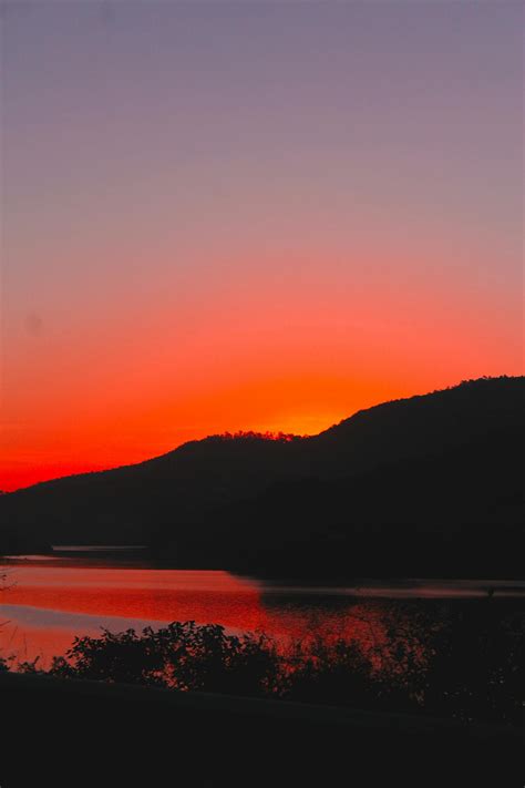 Silhouette of Mountain during Sunset · Free Stock Photo