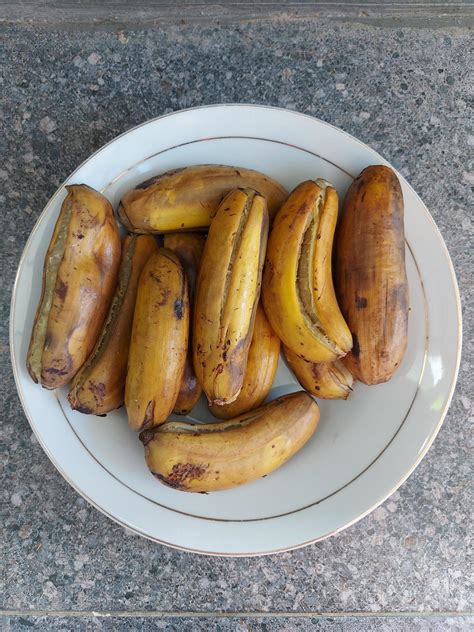 Close-up of boiled banana, a simple traditional Indonesian dish used as a snack. Food with many ...