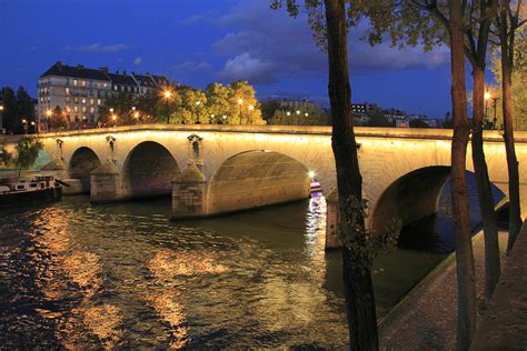 Bridge Crossing The Seine River by John Kieffer