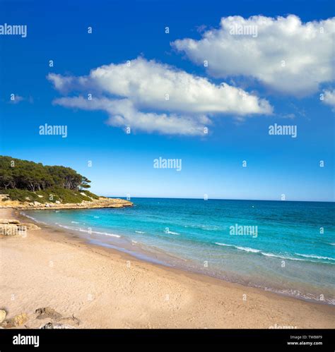 Cala de roca Plana beach in Tarragona beside Waikiki beach also Cala Fonda Stock Photo - Alamy