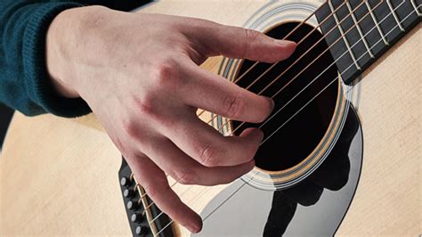 How to play fingerstyle guitar: learn fingerpicking styles | Guitar World