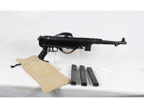 Sold Price: Model Gun Company MP40 Replica - January 6, 0120 10:00 AM CST