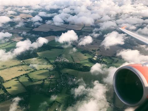 Airplane Above Clouds during Day · Free Stock Photo