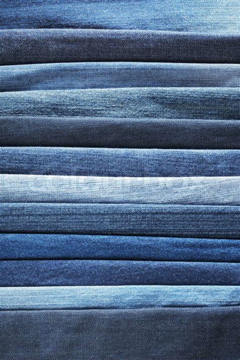 Different shades of blue jeans denim fabrics. | Stock Photo | Colourbox