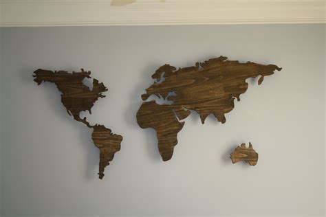 Dan's latest craft is this wooden world map for our office.