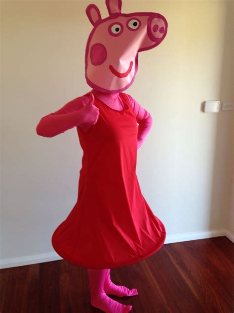 DIY Peppa Pig Costume Head: Paint and Cardboard Dress: Red fabric and hoop Body: Pink Morph suit ...