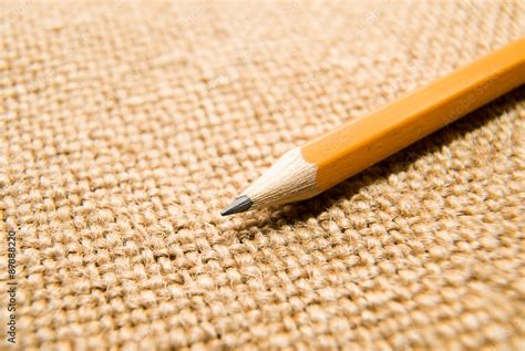 Wooden pencil drawing on an old cloth Stock Photo | Adobe Stock