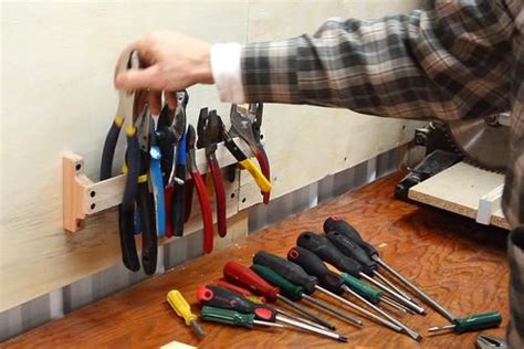 Making wall tool holders Garage Tool Organization, Garage Storage Shelves, Garage Tools, Tool ...