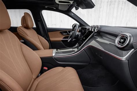 the interior of a car with tan leather seats