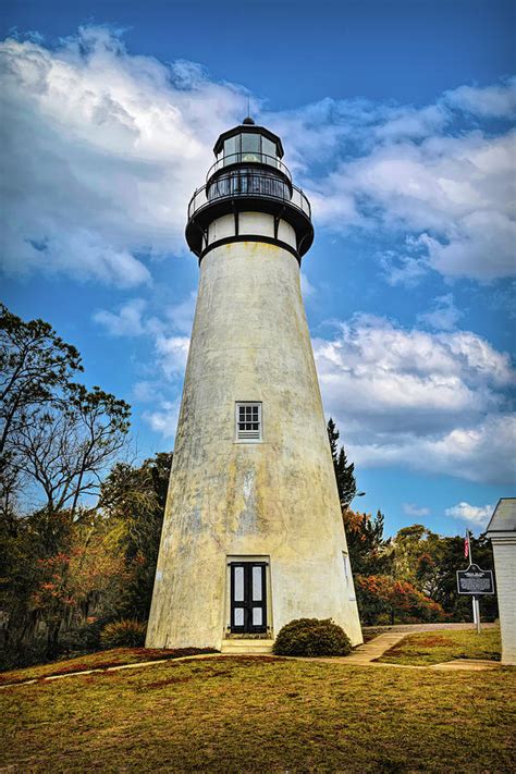 Amelia Island Lighthouse in the Clouds in Autumn Photograph by Debra and Dave Vanderlaan